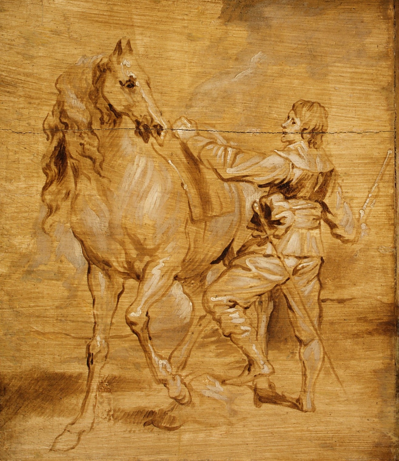 Wooden carving of a man on horseback with a sword
